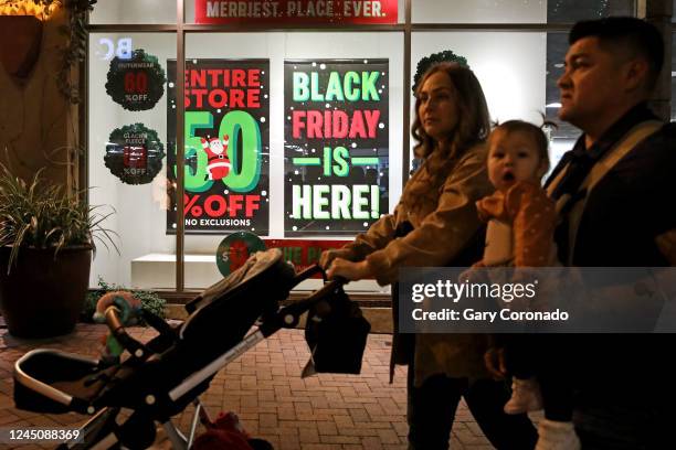 Shoppers enjoy exclusive Black Friday deals on Thanksgiving night through the holiday weekend at the Citadel Outlets on Thursday, Nov. 24, 2022 in...