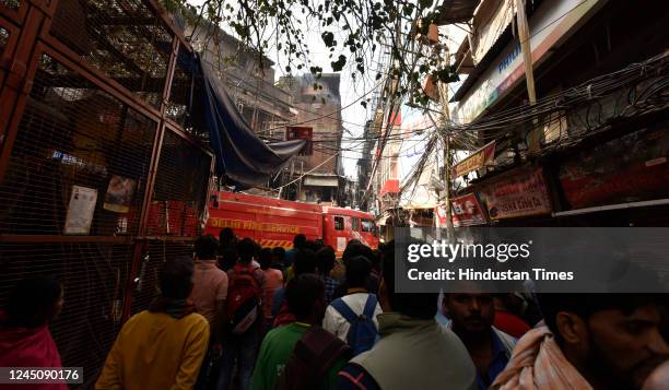 View of burnt and damaged shops after a major fire broke out at Bhagirath palace market, wholesale hub for electrical household goods, on November...