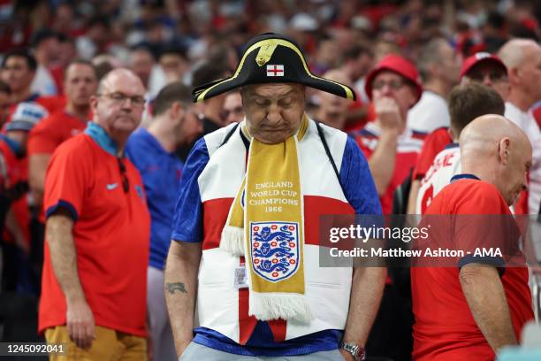 Dejected fan of England reacts at full time during the FIFA World Cup Qatar 2022 Group B match between England and USA at Al Bayt Stadium on November...