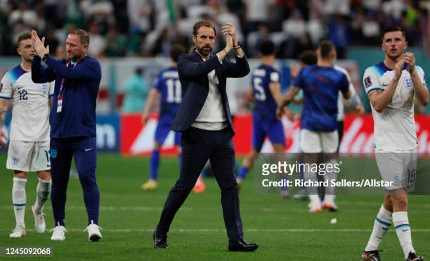 Stephen Holland England asistant manger and Gareth Southgate, England Manager, applaud fans after the FIFA World Cup Qatar 2022 Group B match between...
