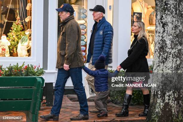 President Joe Biden walks with Hunter Biden, his wife Melissa Cohen, and his grandson Beau after having lunch in Nantucket, Massachusetts, on...