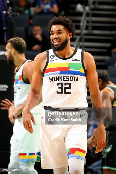 Karl-Anthony Towns of the Minnesota Timberwolves looks on during the game against the Charlotte Hornets on November 25, 2022 at Spectrum Center in...