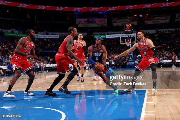 Shai Gilgeous-Alexander of the Oklahoma City Thunder drives to the basket against the Chicago Bulls on November 25, 2022 at Paycom Arena in Oklahoma...