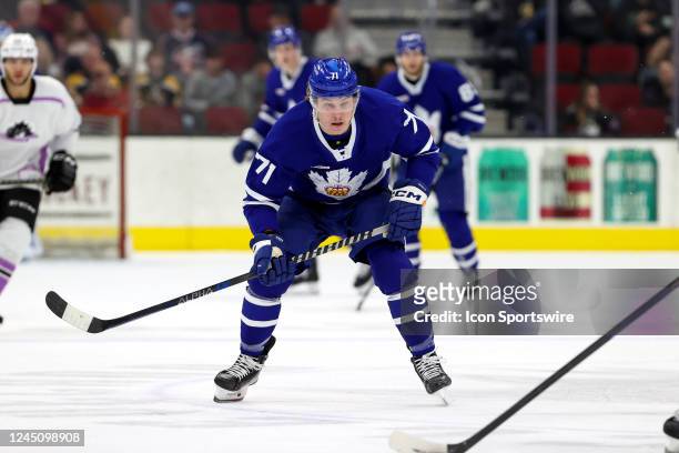 Toronto Marlies left wing Adam Gaudette defends during the third period of the American Hockey League game between Toronto Marlies and Cleveland...