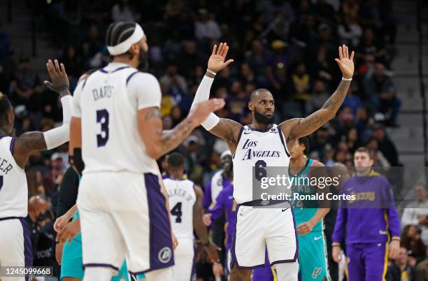 LeBron James of the Los Angeles Lakers reacts after scoring against the San Antonio Spurs in the second half at AT&T Center on November 25, 2022 in...