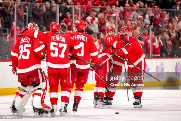 The Detroit Red Wings celebrate their win against the Arizona Coyotes after Dylan Larkin of the Detroit Red Wings scored a goal during the shootout...