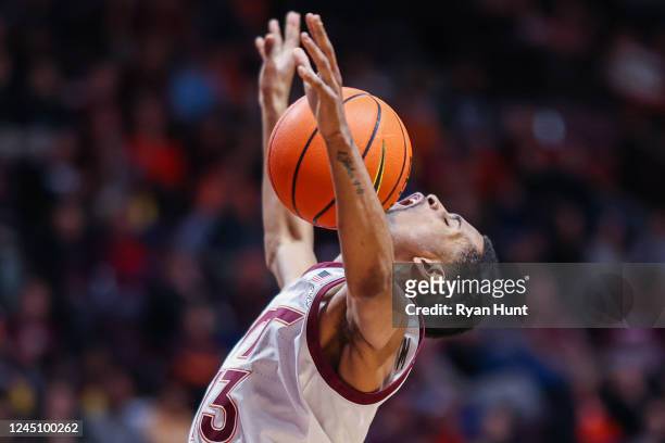 Guard Darius Maddox of the Virginia Tech Hokies loses control of the ball against the Charleston Southern Buccaneers during the second half at...
