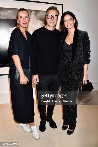 Ute Hartjen, Olaf Heine and Shermine Shahrivar during the "Olaf Heine: Human Conditions" exhibition opening on November 25, 2022 in Berlin, Germany.