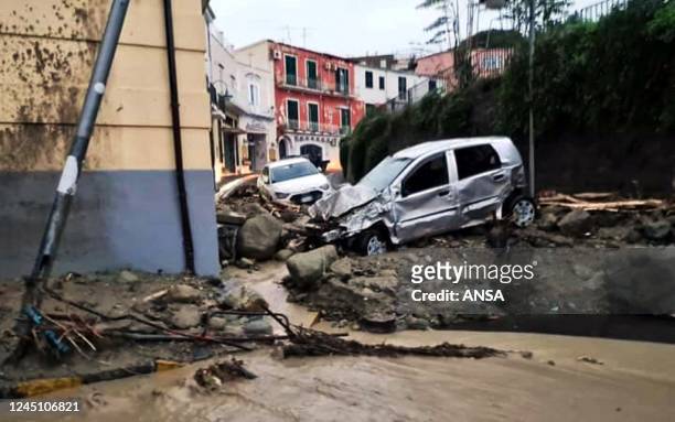 Destroyed cars are picturedin Casamicciola in the southern Ischia island on November 26 following heavy rains that sparked a landslide. - Italy's...