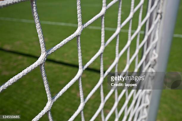 soccer goal with side-netting - fussballtor stock pictures, royalty-free photos & images