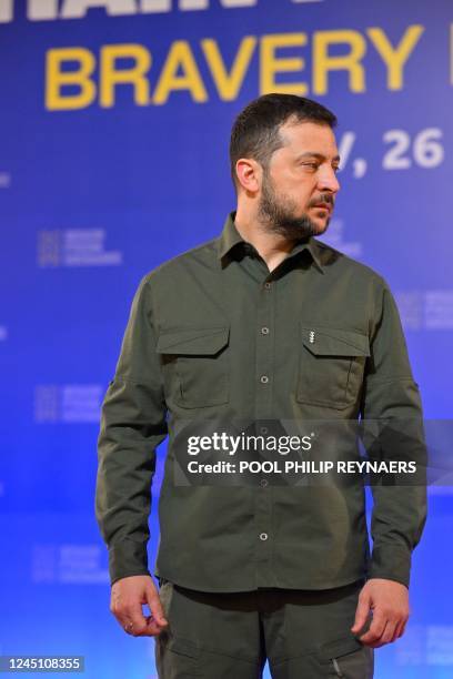 Ukrainian president Volodymyr Zelensky seen under the word 'BRAVERY' at the launch of the 'Grain from Ukraine' humanitarian programme, during a visit...