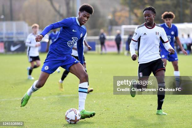 Josh Acheampong runs with the ball of Chelsea during the Chelsea U18 v Fulham FC U18 Premier League match at Chelsea Training Ground on November 26,...