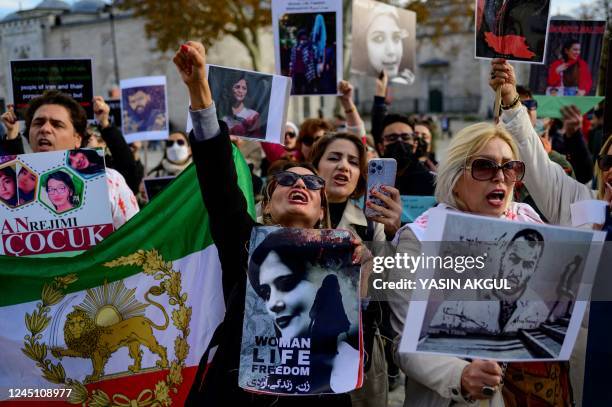 People take part in a rally in support of Iranian women in Istanbul, on November 26, 2022.