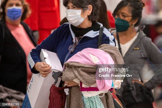 Glendale, CA Customers wait in line to pay for their goods on Black Friday at JCPenney at the Glendale Galleria, Nov. 25 in Glendale, CA.