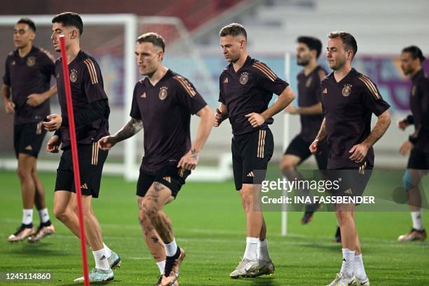 Germany's players take part in a training session at the Al Shamal Stadium in Al Shamal, north of Doha on November 26 on the eve of the Qatar 2022...