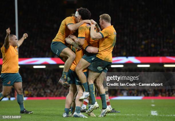 Australia celebrate at the final whistle during the Autumn International match between Wales and Australia at Principality Stadium on November 26,...