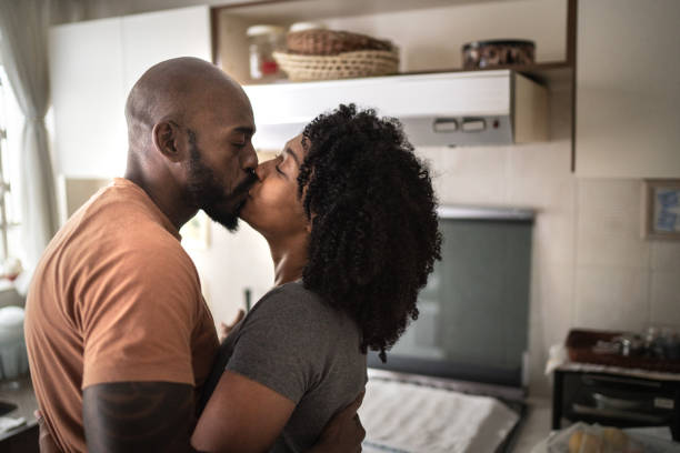 People Said My Marriage Was Over, But This Natural Method Saved It 3 happy couple dancing at kitchen - black couple romantic stock pictures, royalty-free photos & images