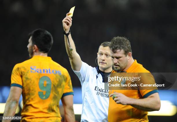 Referee Matthew Carley shows the yellow card to Australia's Jake Gordon during the Autumn International match between Wales and Australia at...