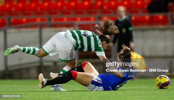 Celtic's Lisa Robertson and Rangers' Tessel Middag clash during a Scottish Women's Premier League match between Rangers and Celtic at Broadwood...