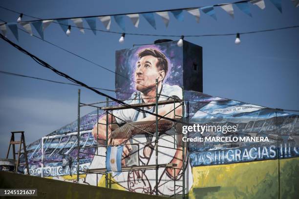 View of a mural depicting Argentine football star Lionel Messi at his childhood home in Rosario, Argentina, taken on November 26, 2022.