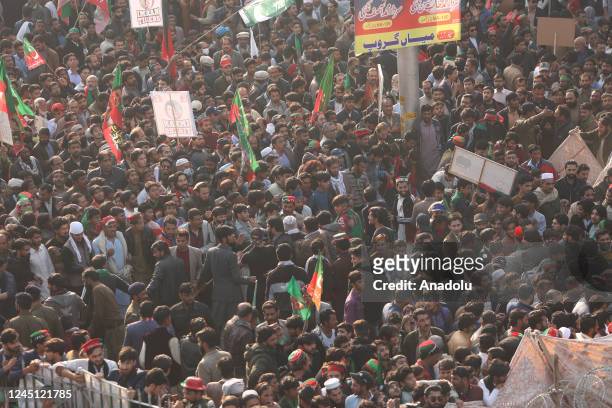 Supporters of former Pakistani prime minister Imran Khan take part in an anti-government long march by former Pakistani prime minister Imran Khan in...