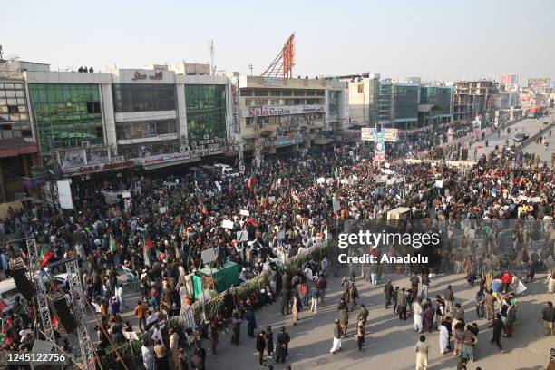 Supporters of former Pakistani Prime Minister Imran Khan, head of the Pakistan Tehrik-e-Insaf party, gather to attend an anti-government rally in...