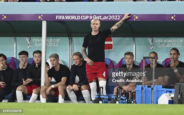 Simon Kjaer of Denmark is seen on the bench during the FIFA World Cup Qatar 2022 Group D match between France and Denmark at Stadium 974 in Doha,...