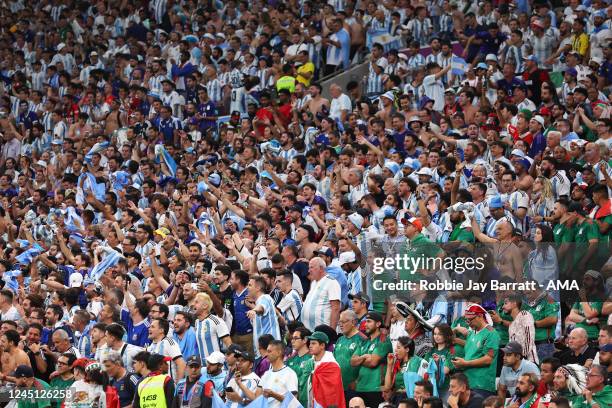 Dejected fans of Mexico in with fans of Argentina during the FIFA World Cup Qatar 2022 Group C match between Argentina and Mexico at Lusail Stadium...