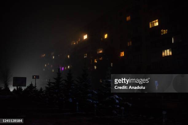 November 24: Kyiv surviving power and water outages. After yesterday attack 70% of people in Kyiv have no electrical power at home. Night scene,...