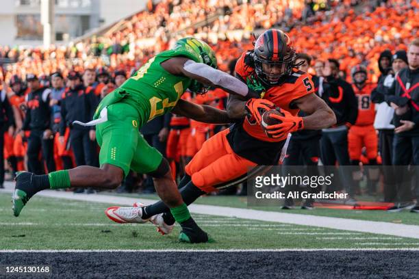 Running back Deshaun Fenwick of the Oregon State Beavers rushes for a touchdown during the second half of the game against the Oregon Ducks at Reser...