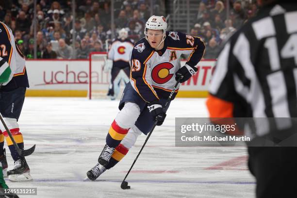 Nathan MacKinnon of the Colorado Avalanche skates against the Dallas Stars at Ball Arena on November 26, 2022 in Denver, Colorado.