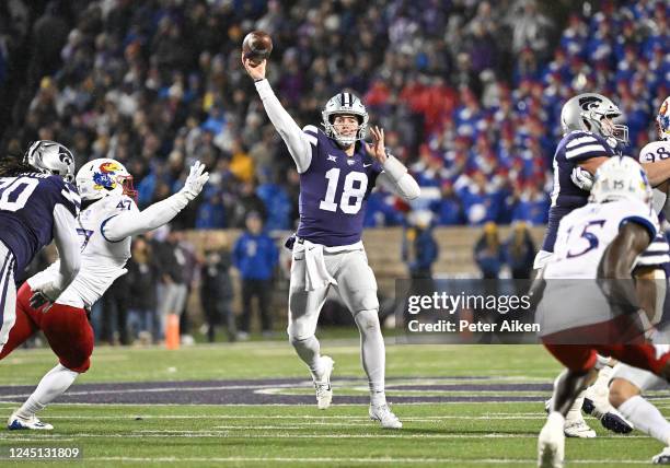 Quarterback Will Howard of the Kansas State Wildcats throws a pass against the Kansas Jayhawks during the first half at Bill Snyder Family Football...