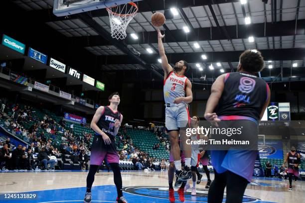 Cassius Stanley of the Rio Grande Valley Vipers drives to the basket against Tyler Hall of the Texas Legends in the first half on November 26, 2022...