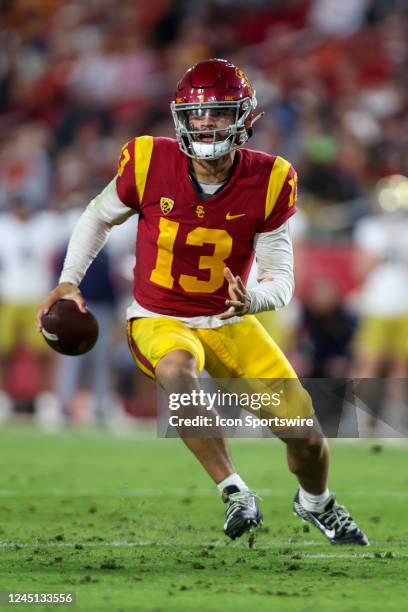 Trojans quarterback Caleb Williams runs out of the pocket for a gain during a college football game between the Notre Dame Fighting Irish against the...