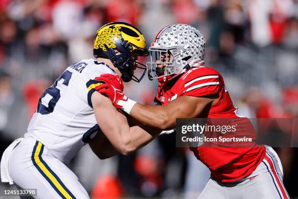 Ohio State Buckeyes linebacker Cody Simon rushes against Michigan Wolverines tight end Luke Schoonmaker during a college football game on November...