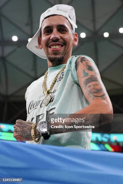Fan of Argentina shows his tattoo of Messi and Diego Maradona prior to the FIFA World Cup Qatar 2022 group A match between Argentina and Mexico at...