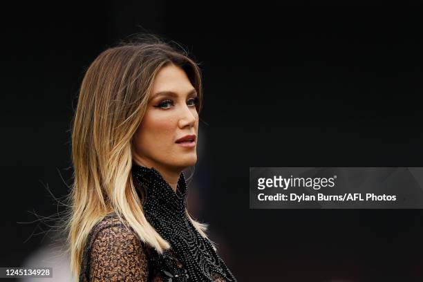 Delta Goodrem looks on during the 2022 AFLW Season 7 Grand Final match between the Brisbane Lions and the Melbourne Demons at Brighton Homes Arena,...