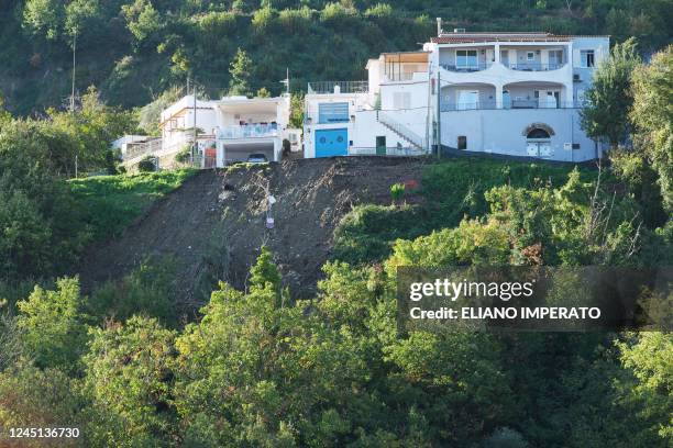 Photo shows houses on the edge of a landslide in Casamicciola on November 27 following heavy rains on the island of Ischia, southern Italy. - Italian...