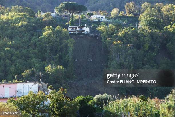 Photo shows houses on the edge of a landslide in Casamicciola on November 27 following heavy rains on the island of Ischia, southern Italy. - Italian...