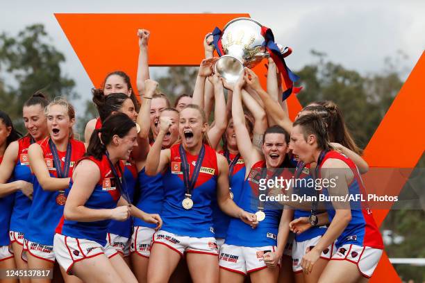The Demons celebrate with the premiership cup during the 2022 AFLW Season 7 Grand Final match between the Brisbane Lions and the Melbourne Demons at...