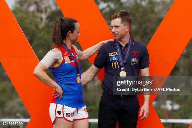 Daisy Pearce of the Demons and Mick Stinear, Senior Coach of the Demons are seen during the 2022 AFLW Season 7 Grand Final match between the Brisbane...