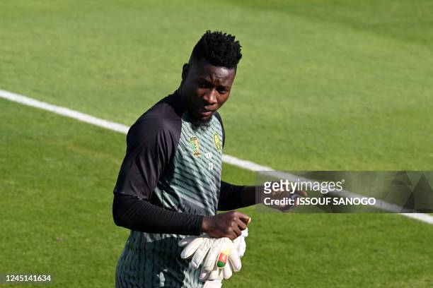 Cameroon's goalkeeper Andre Onana takes part in a training session at the Al Sailiya SC Training Site in Doha on November 27 on the eve of the Qatar...