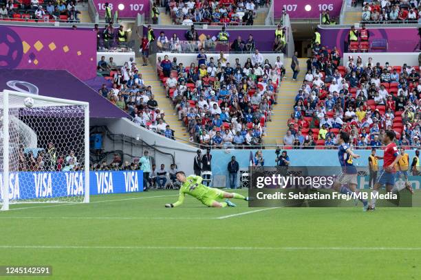 Goalkeeper Eiji Kawashima of Japan cannot stop the shot at goal by Keysher Fuller of Costa Rica to conceed the first goal during the FIFA World Cup...