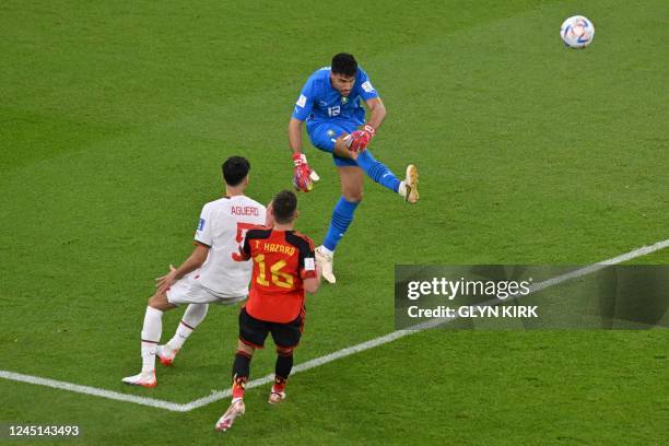 Morocco's goalkeeper Monir El Kajoui kicks the ball during the Qatar 2022 World Cup Group F football match between Belgium and Morocco at the...