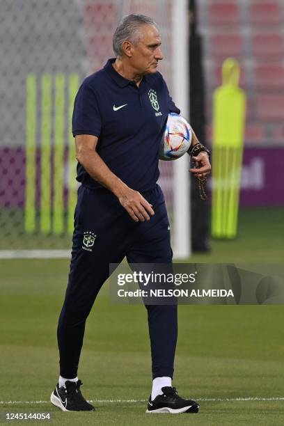 Brazil's coach Tite leads a training session at the Al Arabi SC in Doha on November 27 on the eve of the Qatar 2022 World Cup football match between...