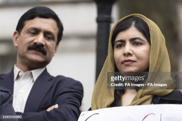 Malala Yousafzai with her father Ziauddin Yousafzai, during a rally in Westminster, London, for the freedom of Afghan women and girls organized by...