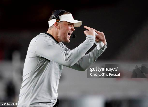 Trojans head coach Lincoln Riley points to his eyes while calling plays to the offense during the first half against Notre Dame at the Coliseum on...