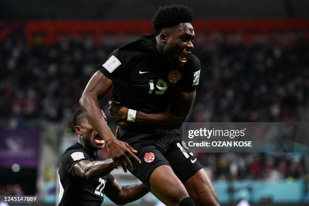 Canada's forward Alphonso Davies celebrates scoring his team's first goal during the Qatar 2022 World Cup Group F football match between Croatia and...