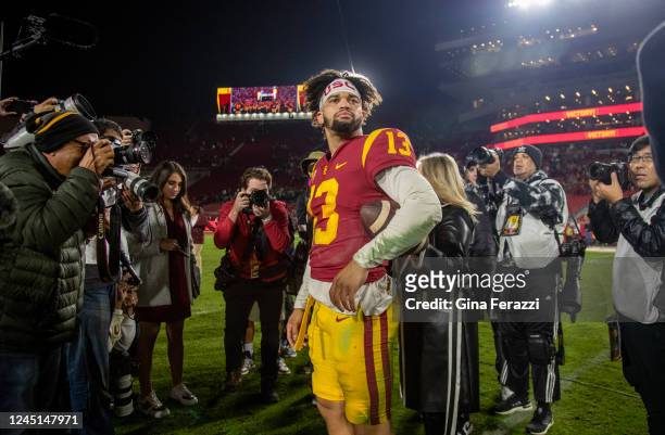 Trojans quarterback Caleb Williams is swarmed by the media after being Notre Dame at the Coliseum on November 26, 2022 in Los Angeles, California.