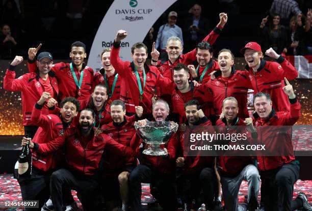 Canada's team celebrates after winning the Davis Cup tennis tournament at the Martin Carpena sportshall, in Malaga on November 27, 2022. Felix...